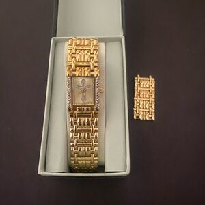 Elegant Gold Women's Watch with Cross Detail